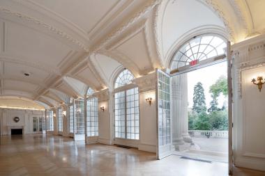 Large french doors open to the Portico.