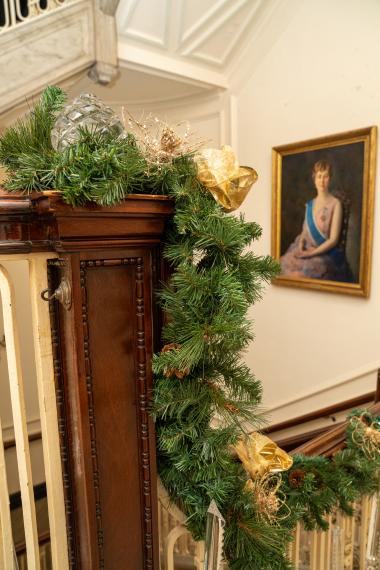Garland strand around a stair banister. 