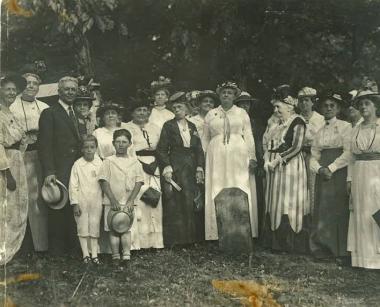 DC Daughters, prior to 1915, at one of the DC Boundary Markers, originally placed in 1792. This photo was taken prior to the placement of the iron enclosure. ( the lady in the striped dress looks like Mary S. Lockwood)