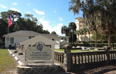  The historic first cemetery in Sarasota County Florida is that of Sarasota's first settlers William and Mary Whitaker and their descendants. The first burial took place in 1879. The Sara De Soto chapter was deeded the cemetery in 1939 by the family which it continues to maintain and assist with Whitaker family funerals. Photo of cemetery and chapter house.