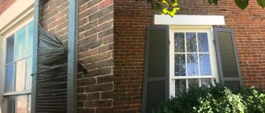 The funds from a DAR Historic Preservation Grant, sponsored by Margaret Gaston Chapter, helped replace and restore many of the wooden elements on the front elevation of the house. The shutters were replaced with exact replicas; the lintels above the windows and the windowsills were scraped, sanded and repainted, as were the front door and the sidelights—a painstakingly slow project taking weeks to complete.