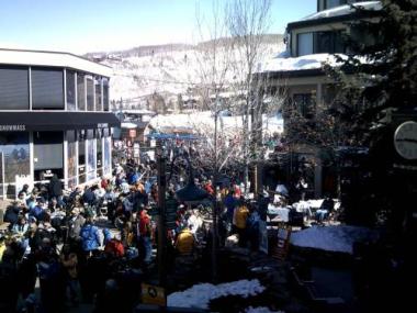 Crowds for as the participants prepare for a day of skiing, snowboarding and other sports modified for their unique disabilities.